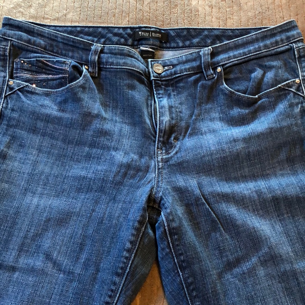 White House Black Market embezzled jeans